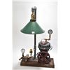 Image 1 : Speedy steam punk table lamp. This light was created using a vintage "Speedy" air compressor believe