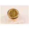 Image 1 : Gent's 14kt yellow gold ring with bezel set Canadian 1/10 oz .999 pure gold coin