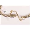 Image 2 : Ladies 14kt yellow gold, tanzanite gemstone and diamond bracelet. Set with 0.35ct of baguette cut wh