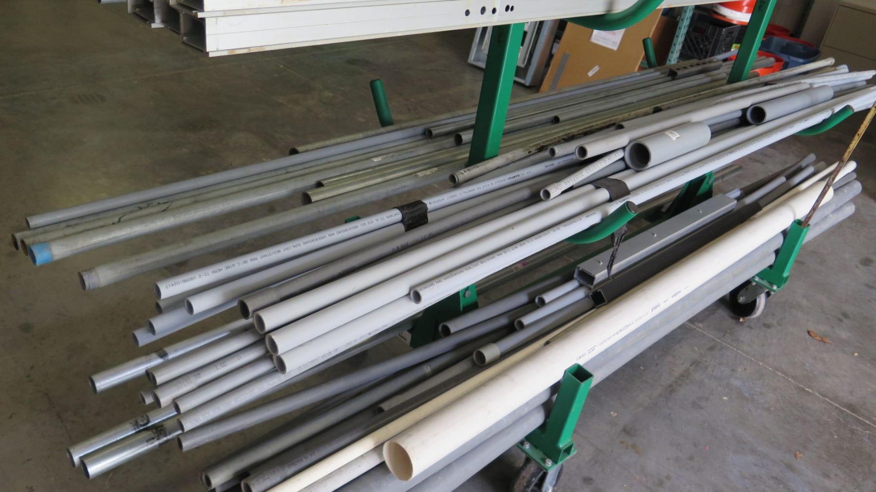 Pipe Rack w/ Misc PVC Pipe, Metal Framing, Conduits, etc - Oahu Auctions