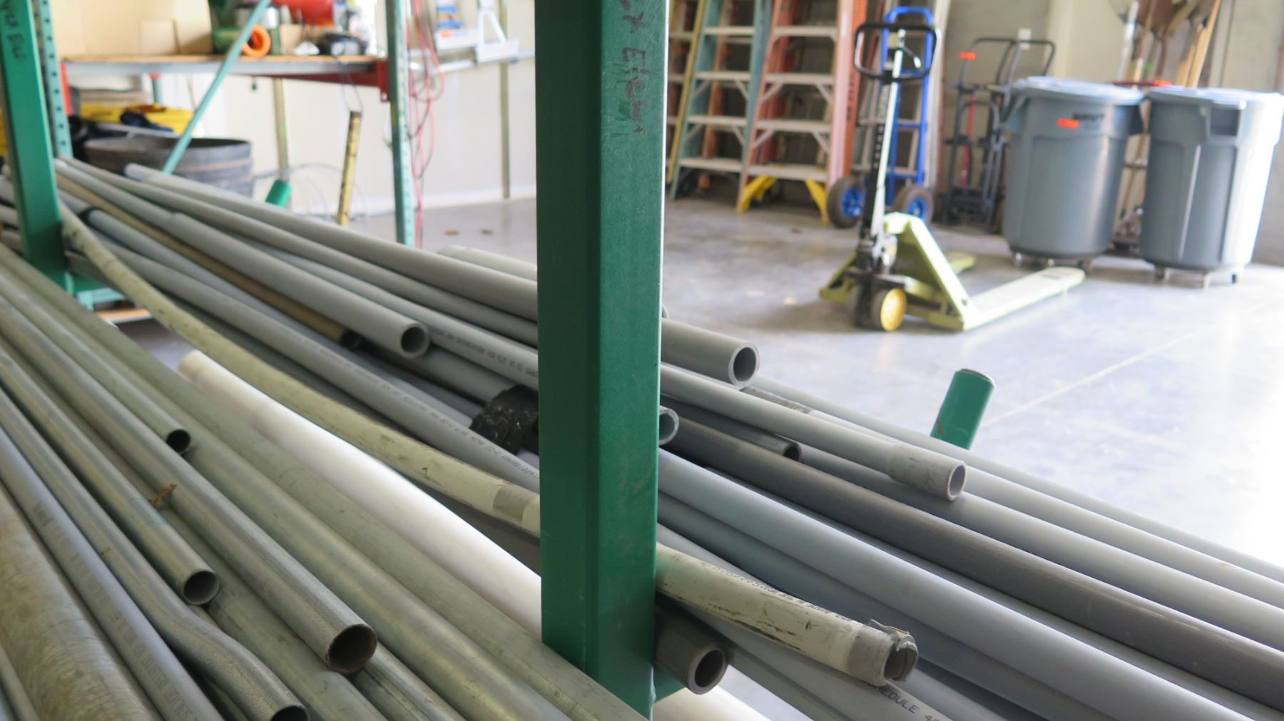 Pipe Rack w/ Misc PVC Pipe, Metal Framing, Conduits, etc - Oahu Auctions