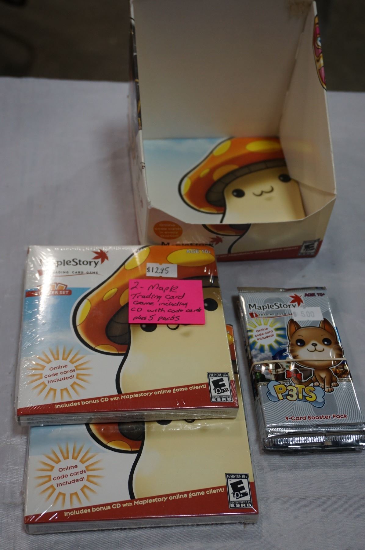 2 MAPLE STORY TRADING CARD GAMES, INCLUDING BONUS CD WITH CODE CARDS PLUS 5 PACKS 2 MAPLE STORY TRADING CARD GAMES, INCLUDING BONUS CD WITH CODE CARDS PLUS 5 PACKS
