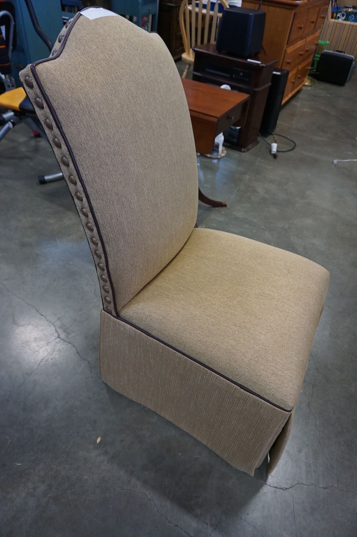 UPHOLSTERED STUDDED ACCENT CHAIR - Big Valley Auction