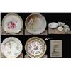 Image 1 : Collection of decorative plates and sauce dishes.