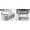 Image 1 : 14kt white gold baguette and round diamond ring a
