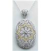 14kt .50ctw diamond floral style pendant.  6.6gr