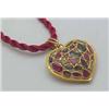 Image 1 : Heart pin or pendant with rubies and sapphires 24