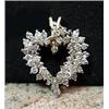 Image 1 : 1.80ctw diamond heart pendant.  4.7grams, 14kt.  