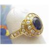 Image 1 : Ladys 18kt yellow gold ring with a oval sapphire 
