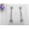 Lady's 14kt white gold diamond dangle earring .50