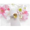 Lady's 14kt white gold ring with 1.60Ct yellow sa