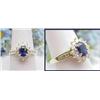 Image 1 : Lady's ring with a 6x4mm oval sapphire and round 