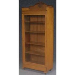 OAK SINGLE DOOR BOOKCASE  with carved crest, refi