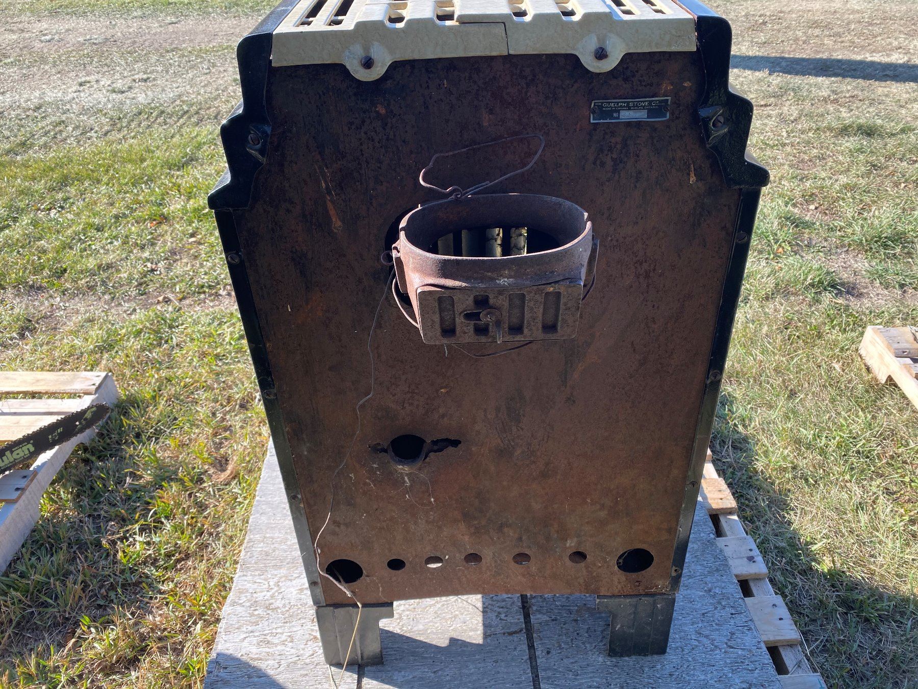 Lot of two(2) stoves. 1) Guelph enamel coated wood stove. 2) DuoTherm
