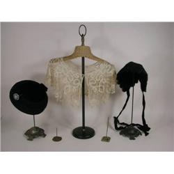 Two hat holders, two ticket holders +