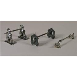 Three knife rests, two dog, one duck