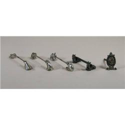 Four knife rests including 1 bird, 2 dogs