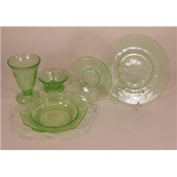 Five pieces of green Depression glass