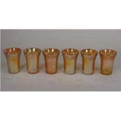 Six Carnival glass tumblers