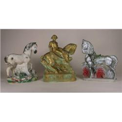 Three chalkware carnival figural prizes