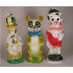 Three chalkware carnival prizes