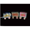 Image 1 : Three circus wagons