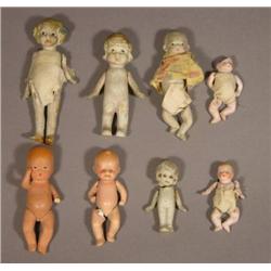 8 Small China/Bisque dolls.