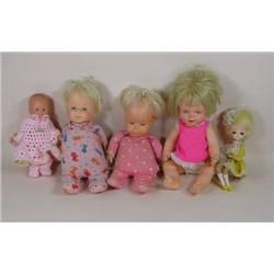 Five various plastic dolls