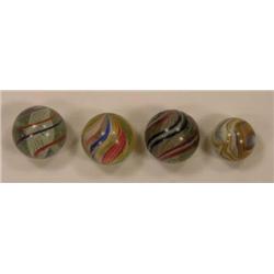 Four candy stripe swirl marbles