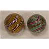 Image 1 : Two candy stripe swirl marbles