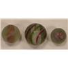 Image 1 : Three candy stripe swirl marbles