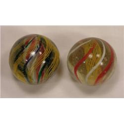 Two candy stripe swirl marbles