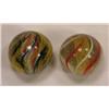 Image 1 : Two candy stripe swirl marbles