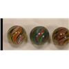 Image 1 : Three candy stripe swirl marbles