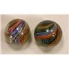 Image 1 : Two candy stripe swirl marbles
