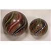 Image 1 : Two candy stripe swirl marbles