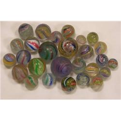Twenty-five candy stripe swirl marbles