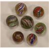 Image 1 : Seven candy stripe swirl marbles