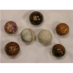 Seven 1 inch Bennington marbles