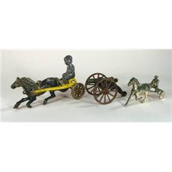 Three cast Iron toys