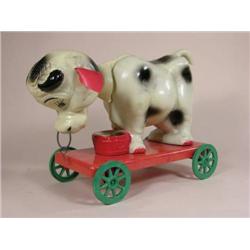 Early plastic cow pull toy