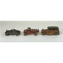 Three cast iron toy cars by A.C. Williams