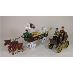 Two  N.O.S. cast iron toys