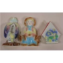 Three unmarked wall pockets, cowboy