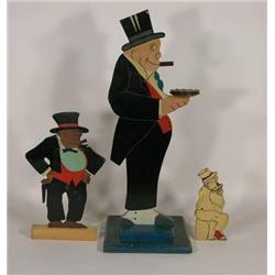 Three wood cut outs of Jiggs