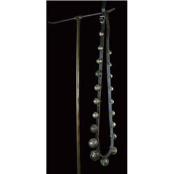 Twenty graduated brass sleigh bells