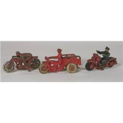 Three Hubley cast iron toy motorcycles