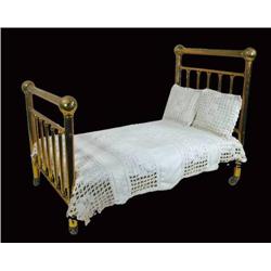 Brass doll bed w/hand crocheted spread