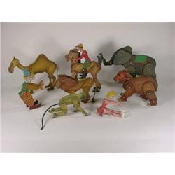 Box of eight wooden circus animals