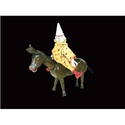 Two Schoenhut wooden mule figure clown